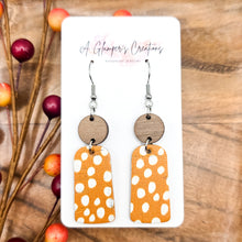 Load image into Gallery viewer, White Dots on Orange &amp; Walnut Wood Dangles
