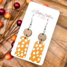 Load image into Gallery viewer, White Dots on Orange &amp; Walnut Wood Dangles
